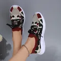 Women's fly-knit platform sneakers with unique burgundy abstract pattern and slip-on design - 36 / Black