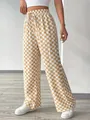 Pantaloni a gamba larga a scacchi a vita alta color kaki e bianco con coulisse - Taglia S / Pantaloni e gonne / Giallo