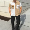 Detailed macro view of the men's color-block corduroy shirt and black pants set. - S / Top And Bottom / Light Grey and Black