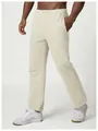 Full body view of men's cream relaxed-fit sweatpants for a casual urban citywalk style - S / Bottoms / Bright yellow