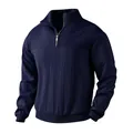 Close-up of navy blue textured cable knit fabric and metal half-zip on the retro sweatshirt. - S / Tops / Navy Blue