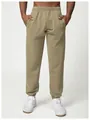 Full front view of men's olive khaki jogger pants with elastic waist and side pockets - Olive Yellow