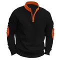 Detailopname van een zwart en oranje sweatshirt met halve rits met kraag- en mouwdetails - Zwart