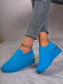 Stylish bright blue knitted wedge sneakers for women featuring a comfortable slip-on fit - 37 / Sky Blue