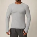 Men's light grey slim fit long sleeve quick-dry athletic shirt featuring thumb hole cuffs - S / Tops / Light Gray