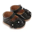 Detalle de zapatos de princesa para bebé negros con flores de encaje, perlas y suela de goma - Negro