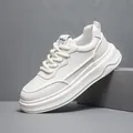 Dettaglio della sneaker platform bianca con finitura in pelle e suola spessa - 38 (Taglia Cuoio Standard) / Bianco avorio