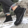 Black high-top outdoor snow boots with non-slip soles shown in a snowy rocky terrain - 36 / Black