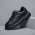 Eleganti sneaker nere da uomo con suola spessa e tomaia in morbida pelle casual - Nero