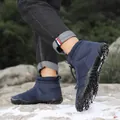 Waterproof navy blue high-top snow boots with rubber sole on snowy outdoor ground - Size 36 / Dark Blue