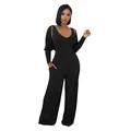Detail der gerippten Textur des schwarzen ärmellosen Jumpsuits mit passendem Bolero - Schwarz