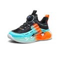 Kids' boys athletic sneaker featuring rotating dial buckle and vibrant orange turquoise accents - 29 / Black & Orange