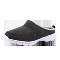 Black winter mule slippers featuring pink zigzag stitching and cozy grey faux fur lining - 36 / Grey and Pink