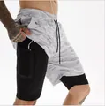 Men's 2-in-1 camouflage sports shorts with phone pocket and earphone hole feature. - White Camouflage