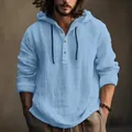 Close-up detail of light blue men's hooded linen shirt with three buttons and drawstring - S / Tops / Light Blue