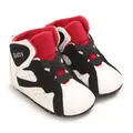 Detail of red and black high-top infant sneakers with soft PU leather soles for babies - White