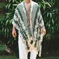 Detailed view of men's green geometric print beach poncho with decorative fringe tassels - S / Robe / Dark Green