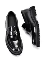 Detailed shot of black patent leather loafers for men featuring a thick platform sole - 38 / Black