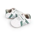 Detailansicht der weiß-grünen Baby-Lauflernschuhe mit praktischem Klettverschluss - Grün