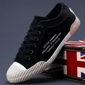 Classic black men's casual canvas shoes with textured white toe cap and lace-up design - 38 / Black and Beige (24873)