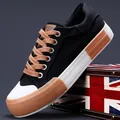 Trendige schwarze Herren-Sneaker aus Canvas mit braunen Schnürsenkeln und Gummisohle - 38 / Schwarz und Weiß (24831)