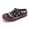 Detailweergave van vintage ponyhaar damesschoenen met 3D-bloem en getextureerde zool - 36 / Zwart