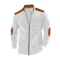 Close-up of white ribbed velvet jacket featuring contrast brown corduroy shoulder patches - White