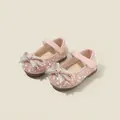 Elegant pink toddler girl princess shoes featuring pearls and a rhinestone bow - Pink