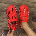 Detailed shot of red marble pattern outdoor sport clogs with a comfortable breathable design - 38 / Camo Red