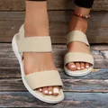 Detailweergave van beige dames sandalen met elastische bandjes en dikke witte zool - Beige