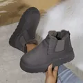 Detailansicht der dunkelgrauen Schneestiefel mit dicker Sohle und Plüschfellfutter - Grau