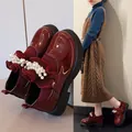 Detailed view of burgundy patent leather girl's shoes with pearl accents and knit collar - Size 23 (Inner Length 14.5cm) / Burgundy