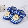 Detail view of blue plaid baby sandals with a cute cartoon bear decoration - Size 11 (10.5cm) / Guanguan Style / Blue