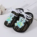 Soft sole black baby walking shoes featuring gold stripes and a blue bear design - Size 11 (10.5cm) / Running Style / Black