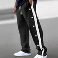 Détail du pantalon décontracté en jacquard noir avec boutons à bandes latérales blanches - S / Bas / Noir