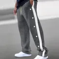 Vue détaillée du pantalon décontracté large en jacquard pour homme avec boutons latéraux - S / Bas / Gris foncé
