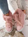 Vista detallada de botas de nieve rosas para mujer con forro de pelo sintético suave - Rosa