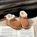 Warm children's snow boots with soft fleece lining and decorative stitching. - Camel