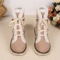 Warm tan lace-up snow boots featuring white faux fur lining and thick platform soles - 36 / Off White