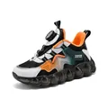 Children's sports shoes with rotary buckle and thick soft sole in black and orange - Black Orange Leather Surface