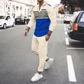 Men's hooded waffle knit tracksuit with striped color block design on street - Khaki & Blue Block (Khaki Pants)