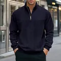 Close-up detail of men's navy blue quarter-zip jacquard sweatshirt on male model - S / Tops / Navy Blue