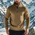 Close-up of a men's khaki quarter-zip fleece sweatshirt against a snowy mountain. - S / Tops / Khaki