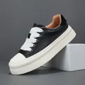Baskets compensées en cuir noir élégantes avec larges lacets blancs pour hommes - 38 / Noir