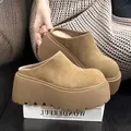 Close-up detail of stylish tan suede platform mules featuring extra thick rugged soles - 35 / Chestnut