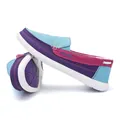 Men's casual canvas slip-on loafers featuring a blue, purple, and magenta patchwork design - Green