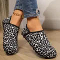 Close-up of stylish leopard print warm home shoes with soft soles for yoga and lounging - Leopard Print