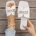 Detail of white square toe flat sandals with chunky gold chain and embossed texture - 35 / White