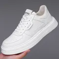 Sneaker bianche minimaliste in pelle da uomo con suola in gomma antiscivolo elegante - Bianco