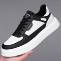 Scarpa casual da uomo in pelle bianca e nera con suola platform e lacci classici - Nero